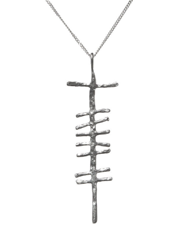 Love rustic silver pendant on white background