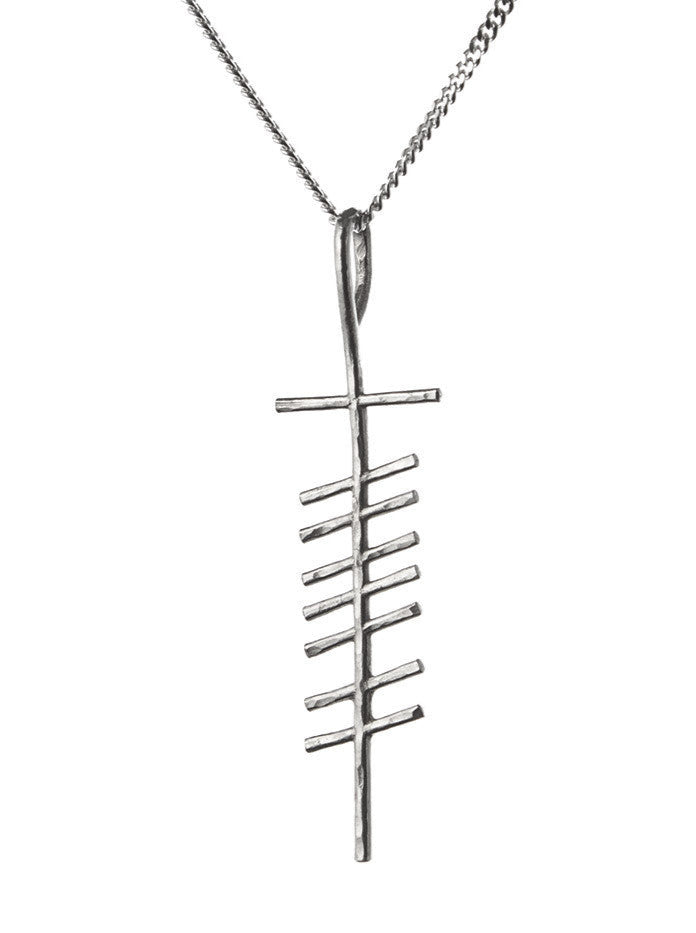 Love silver pendant on white background