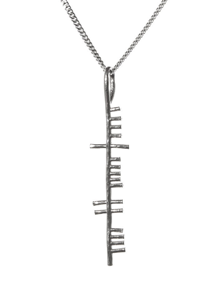 Happiness silver pendant on white background